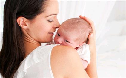 cuddling a newborn