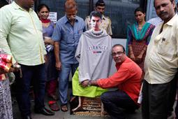 Congress MLA Covers Aamir Khan's PK Poster Cutout in Salem,MA
