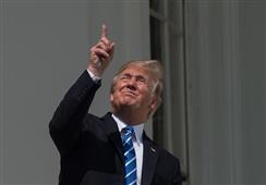 US President Donald Trump stares directly at Solar Eclipse, despite warning in New York,NY