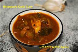 Bitter gourd curry with garlic | Pagarkai Poondu Kuzhambu recipe by Madraasi in New York,NY